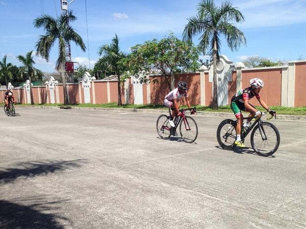 Mark Galedo (right) and George Oconer (left), two of the country's best cyclists, are among the pro riders who frequent Neopolitan Business Park to race and socialize