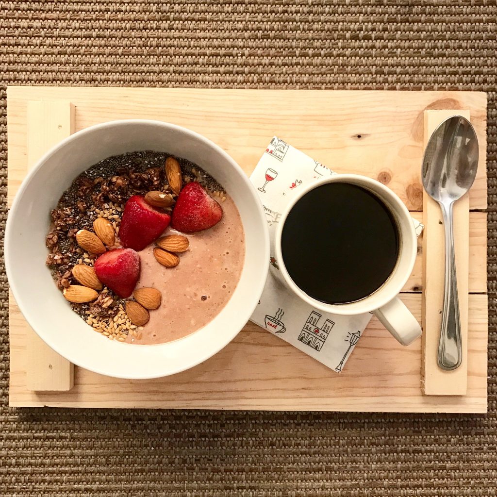 Top off your smoothie bowl with chia seeds, flax seeds, sunflower seeds, granola, nuts, coconut flakes