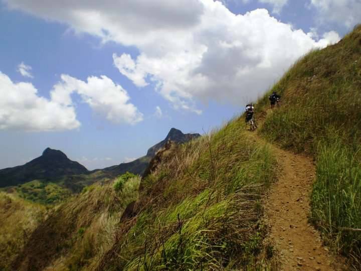 The single-track path going up the peak