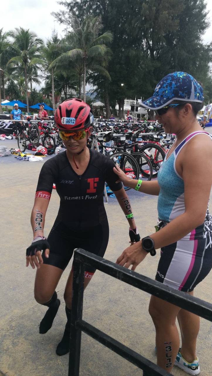 Let these female triathletes inspire you to form your own team: Kaye and Glenda in transition