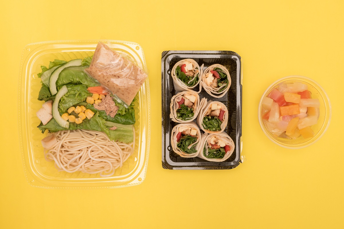 Lawson convenience foods: pasta with green salad, chicken wraps, and fruit cocktail