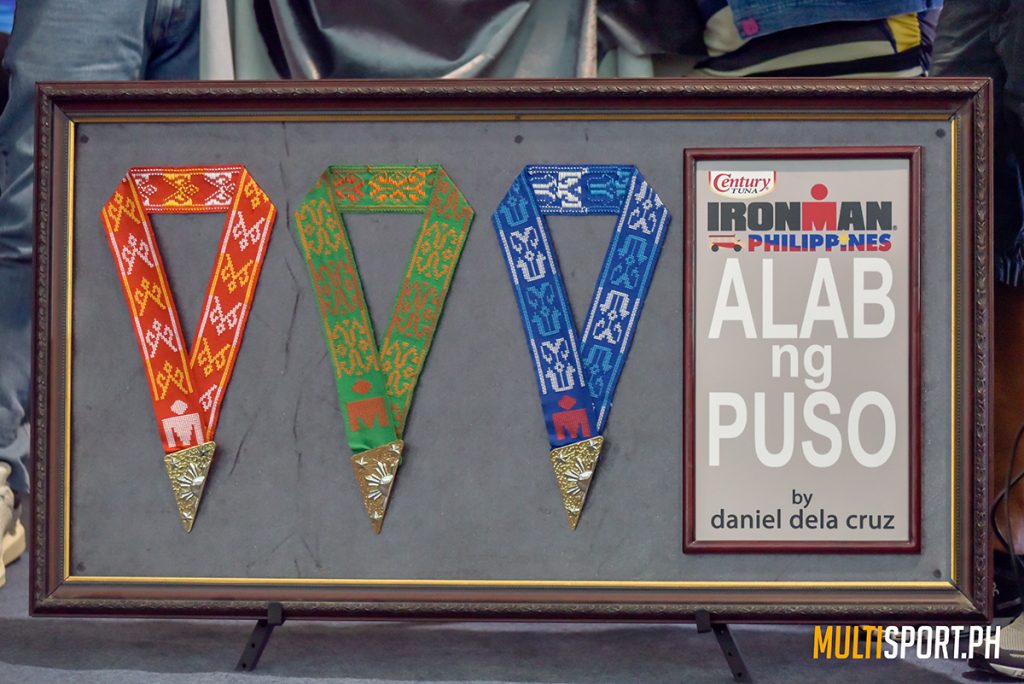 The Alab ng Puso medals designed by Daniel de la Cruz