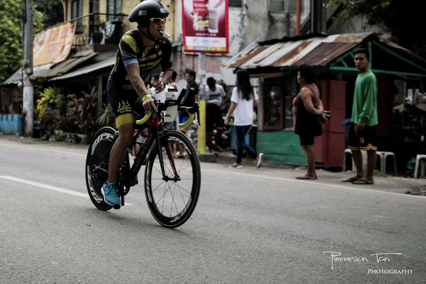 Ang pedaling his way at the 21km bike course of the Regent Aguila Ironman 70.3 race in Cebu