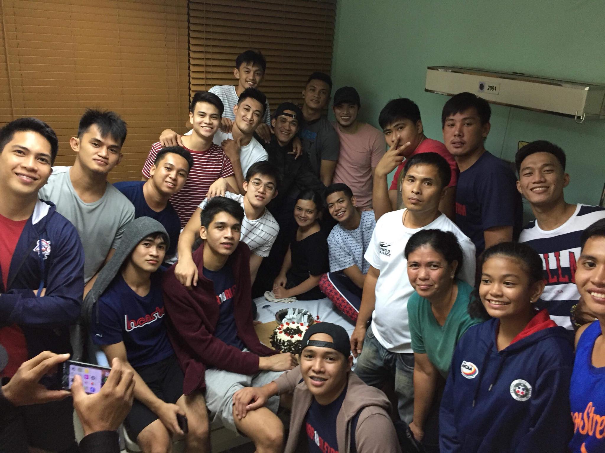 The Letran team paid Jerrick Balanza a visit after their win yesterday against Arellano to celebrate his birthday | Photo courtesy of Gelay Davocol