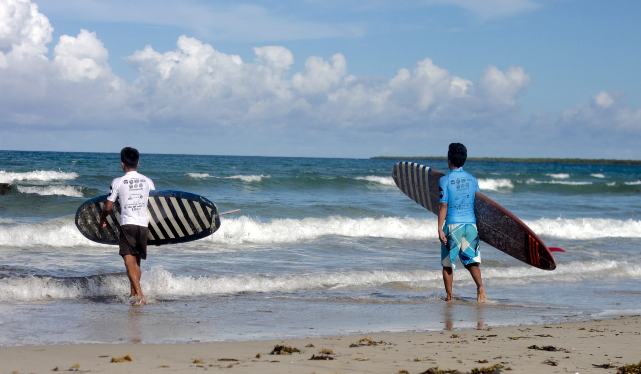 The key to keeping children away from bad habits is to involve them in sports such as surfing