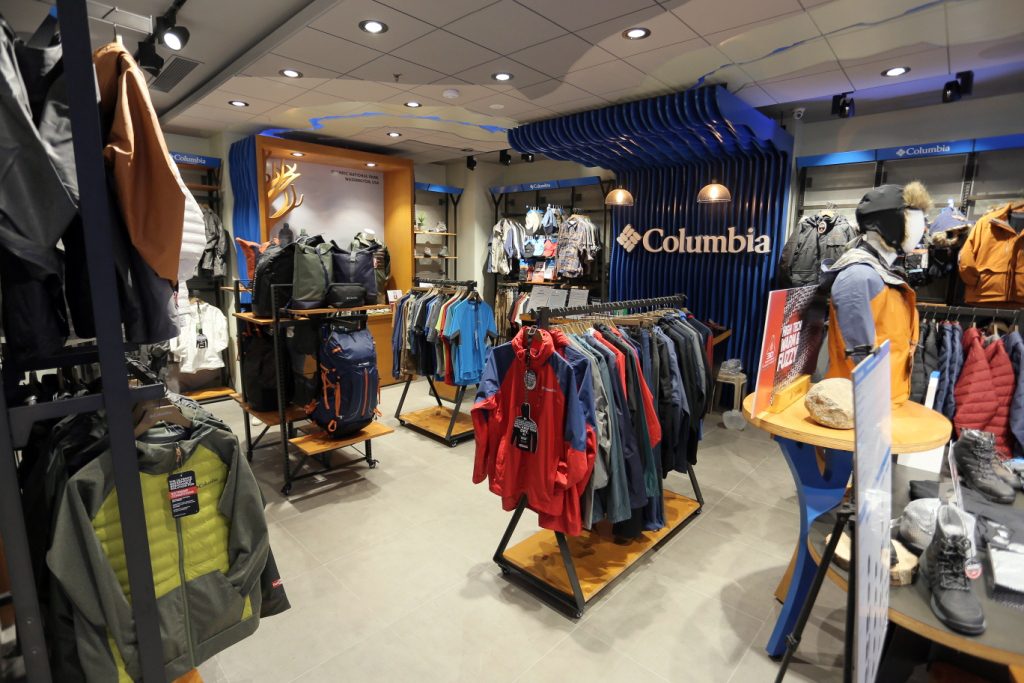 The Columbia flagship store integrates evergreen photography into the interior design