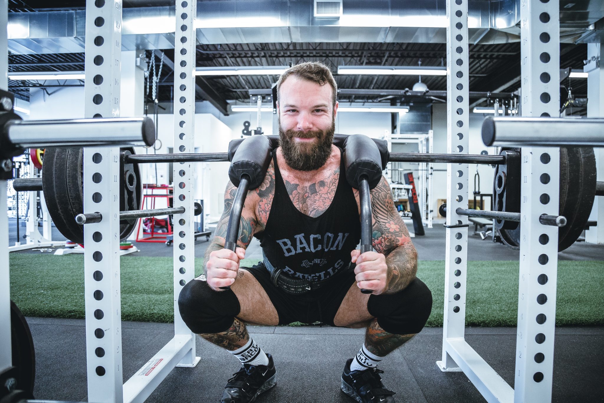 Racks are versatile home gym equipment since you can also attach pull-up bars and suspension trainers