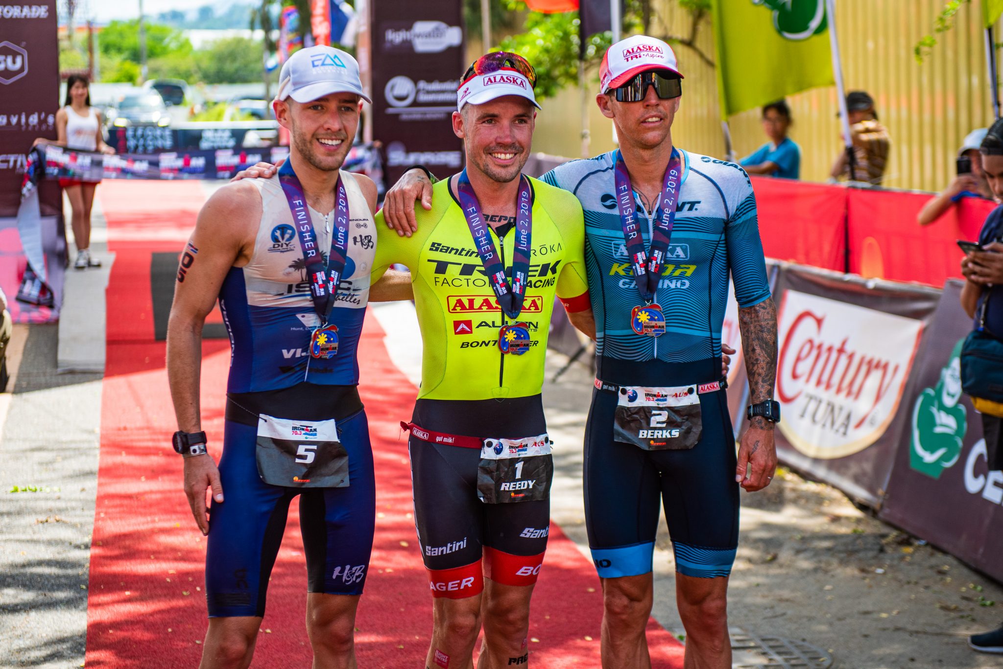 Century Tuna Ironman 70.3's top male pros Nick Baldwin (3rd), Tim Reed (1st), and Tim Van Berkel (2nd)