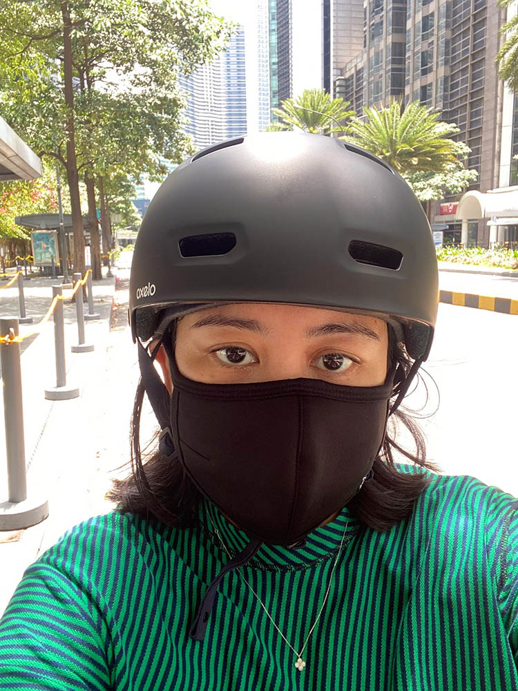 A mask, helmet, and a vivid shirt are necessary bike accessories so motorists can see you from afar