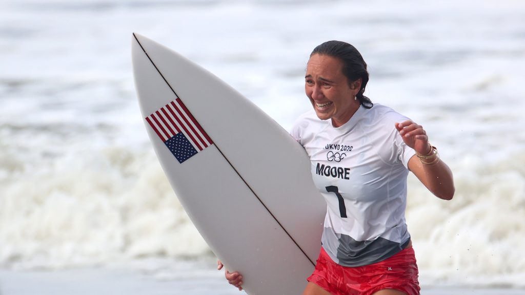 Carissa Moore of the United States celebrates after winning gold in the surfing competition