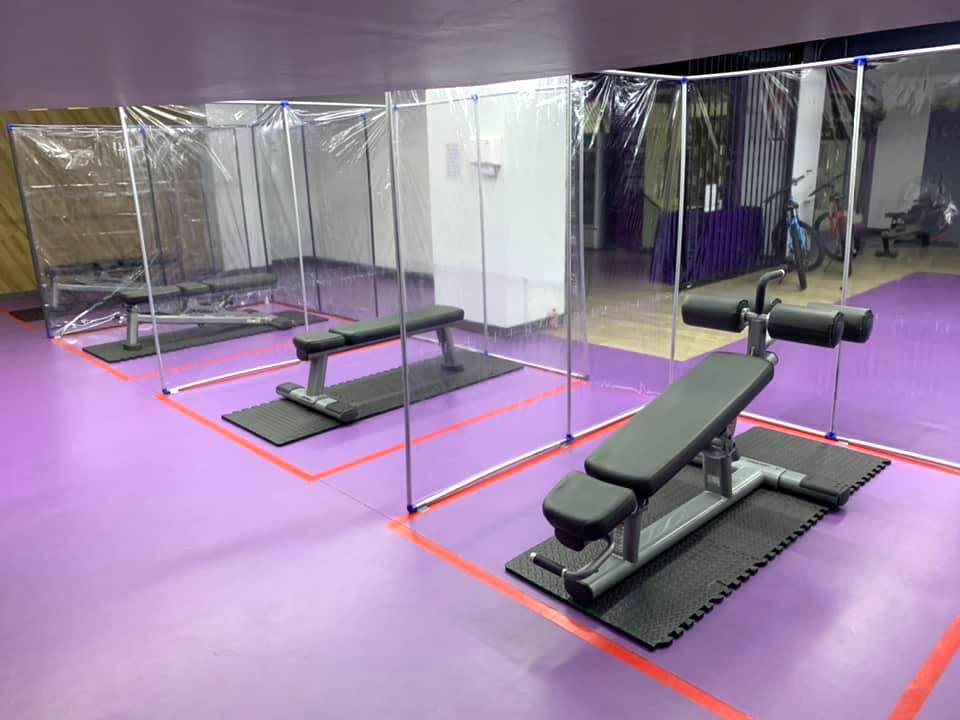 In addition to the plastic barriers, this Anytime Fitness gym placed exercise equipment two meters apart