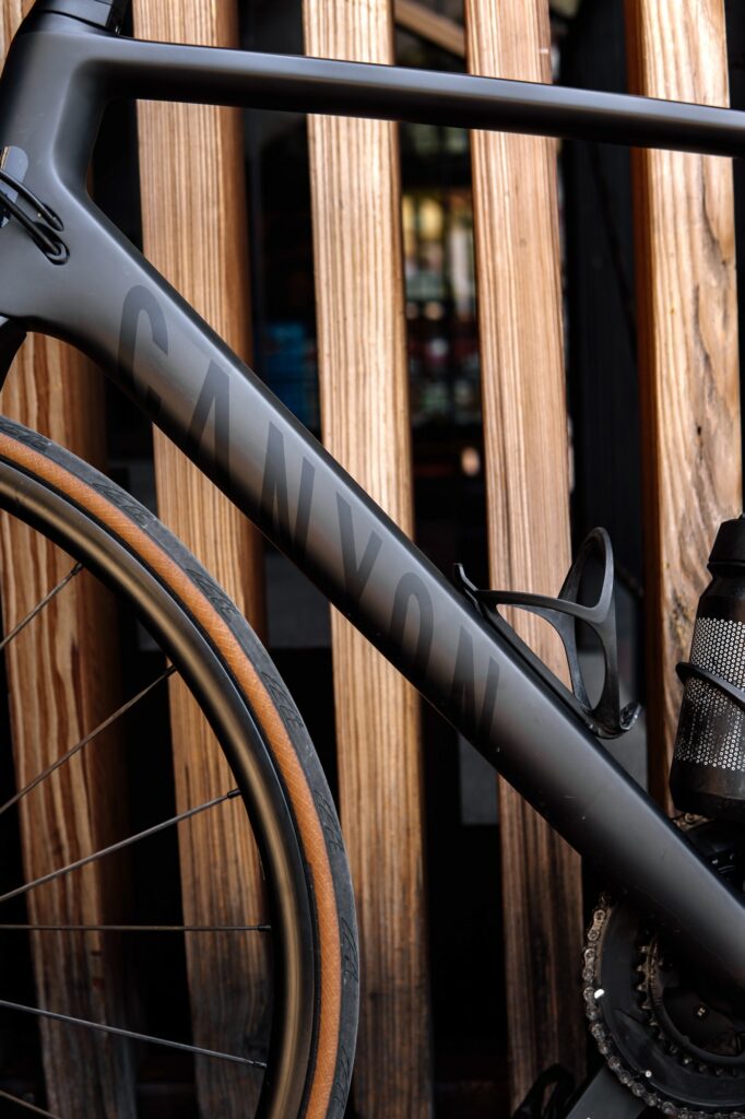 More expensive water bottle cages are made of carbon fiber or materials like titanium