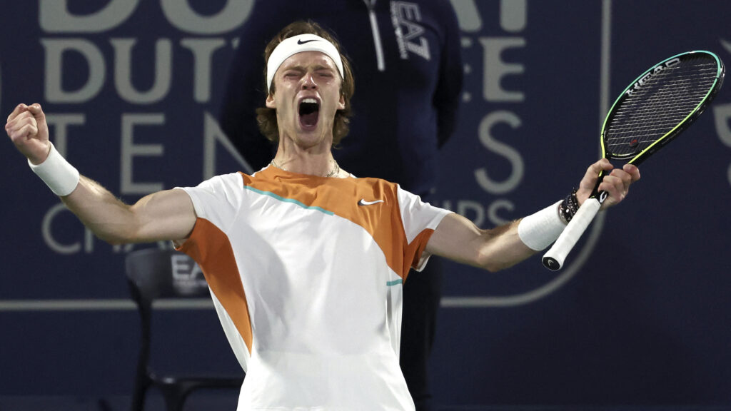 Russia's Andrey Rublev celebrates after defeating Poland's Hubert Hurkacz during their semifinal match at the ATP Dubai Duty Free Tennis Championship