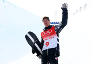 Shaun White of the United States poses for pictures as he retires from the sport