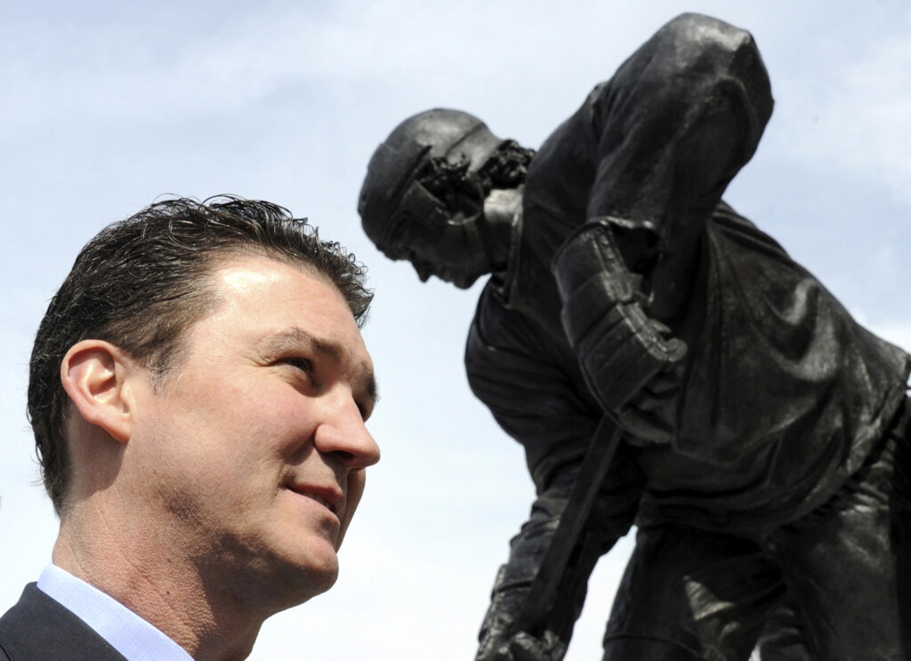 Pittsburgh Penguins' hockey legend Mario Lemieux speaks to the media and crowd after "Le Magnifique", a  statue honoring his career was unveiled at Consol Energy Center in Pittsburgh, Pennsylvania on March 7, 2012