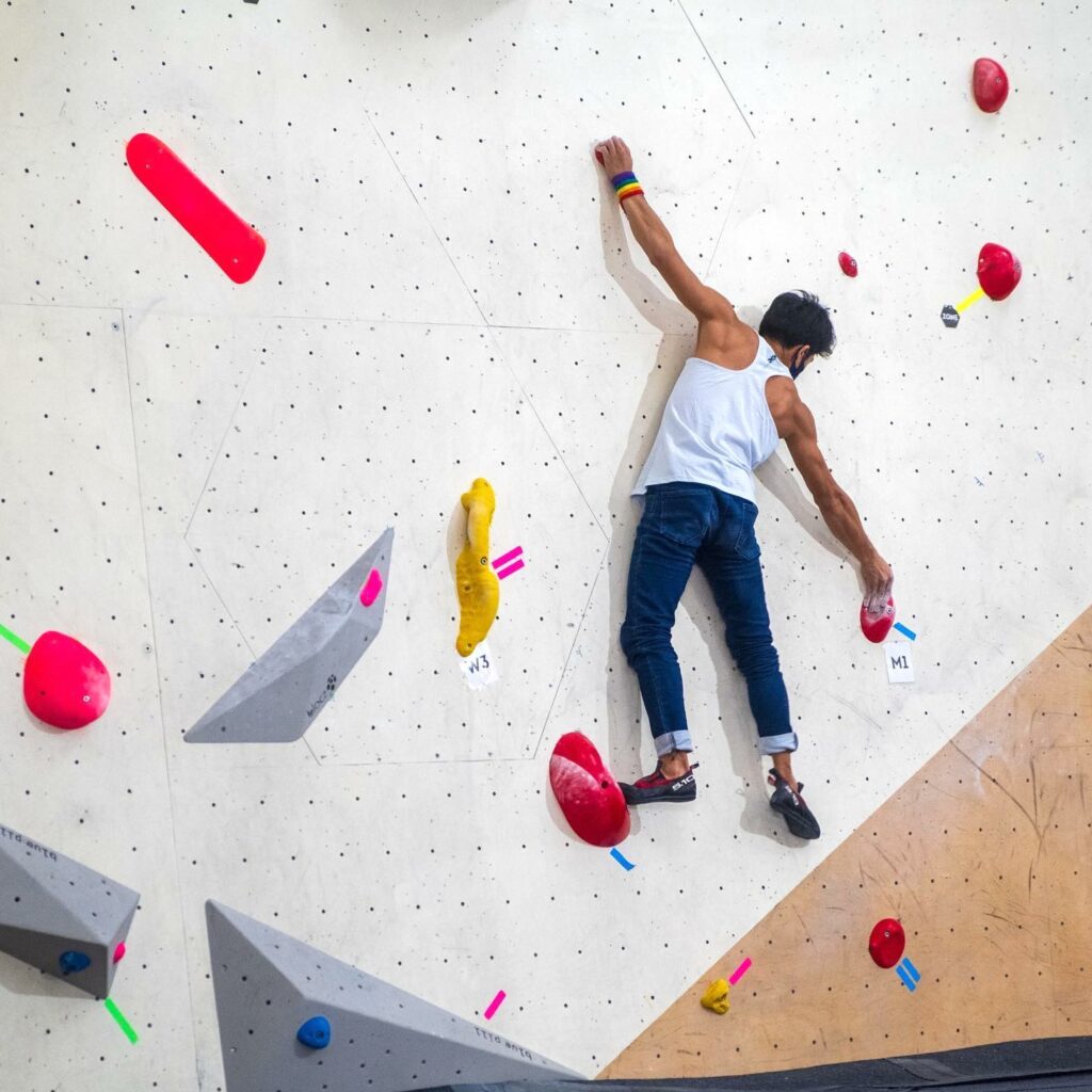He plays a number of different sports—including bouldering—and all have welcomed him into their community