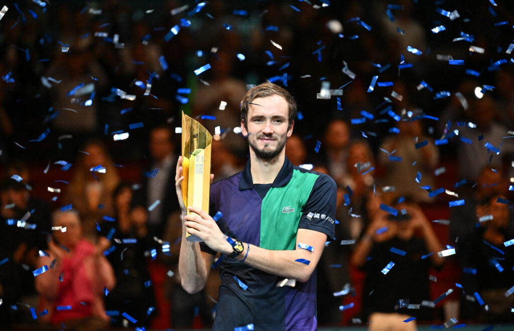 Daniil Medvedev holds the trophy as he celebrates his victory over Canada's Denis Shapovalov after the final match of the ATP Vienna Open tennis tournament in Vienna, Austria