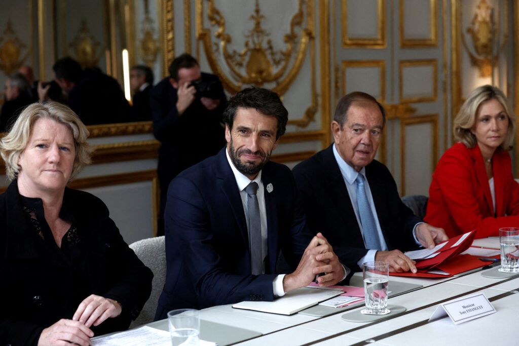 Head of Paris 2024 Olympics Tony Estanguet, president of Greater Paris Metropolis Patrick Ollier, Valerie Pecresse, head of the Paris Ile-de-France region, and Brigitte Henriques, head of the CNOSF, attend a meeting with French President Emmanuel Macron | File photo by Benoit Tessier/Pool/Reuters