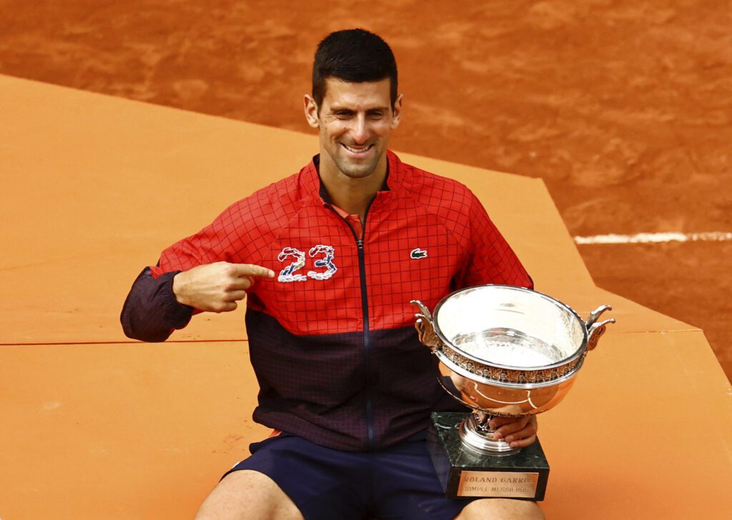 Tennis - French Open - Roland Garros, Paris, France - June 11, 2023 Serbia's Novak Djokovic poses with the trophy after winning the French Open and his 23rd Grand Slam REUTERS/Clodagh Kilcoyne