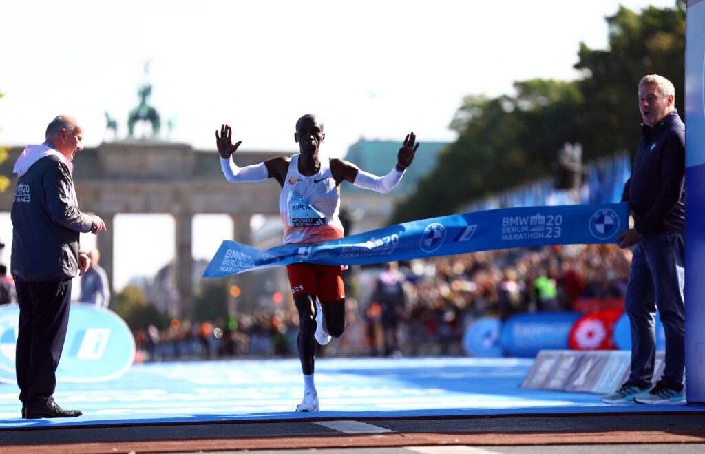 Kenya's Eliud Kipchoge crosses the finish line to win the Berlin Marathon