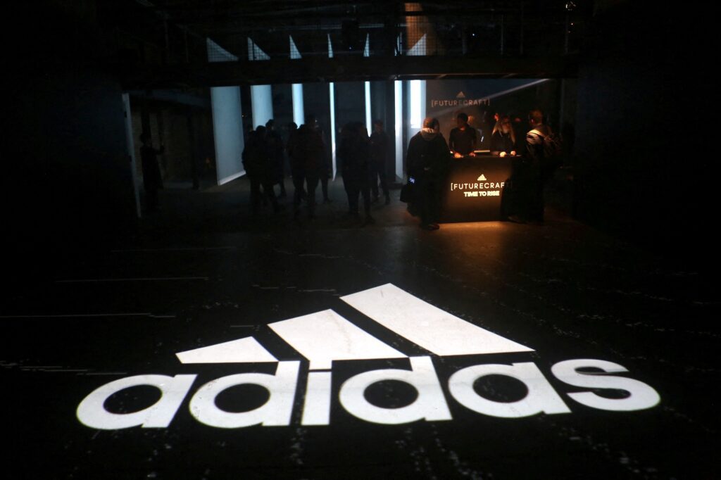 An Adidas logo is seen at the new Futurecraft shoe unveiling event in New York City, New York, U.S. April 6, 2017. REUTERS/Joe Penney/File Photo/File Photo